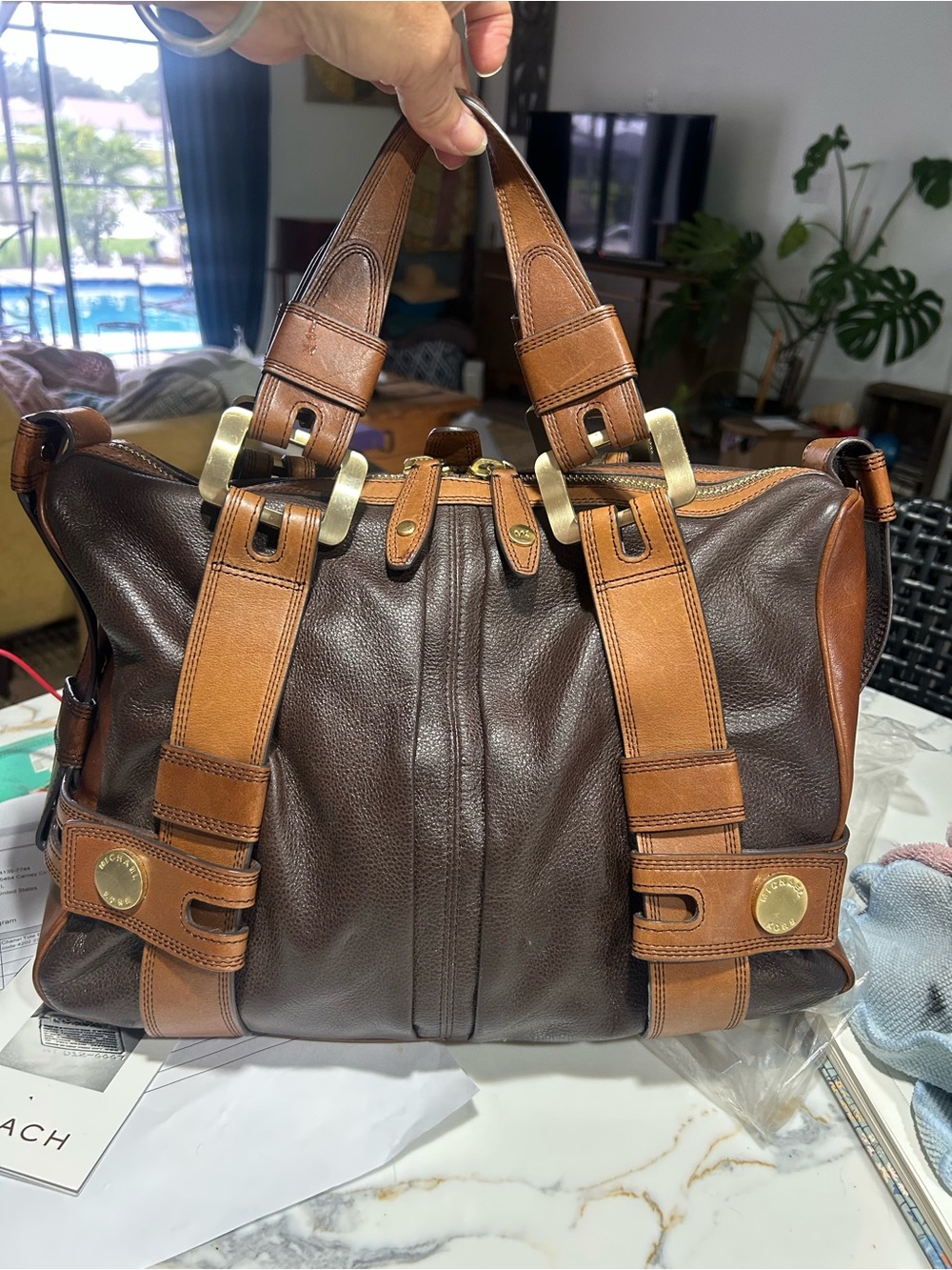 Michael Kors Leather Two-Tone Brown Travel Tote Bag with chunky hardware